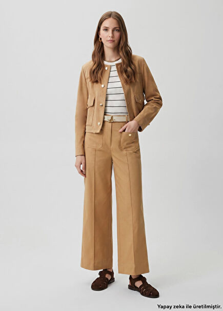 Beige gold button detailed trousers