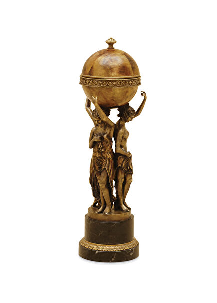 Bronze metal decorative object with a celebratory bowl of a globe