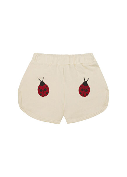 Cream-colored ladybird patterned girls' shorts